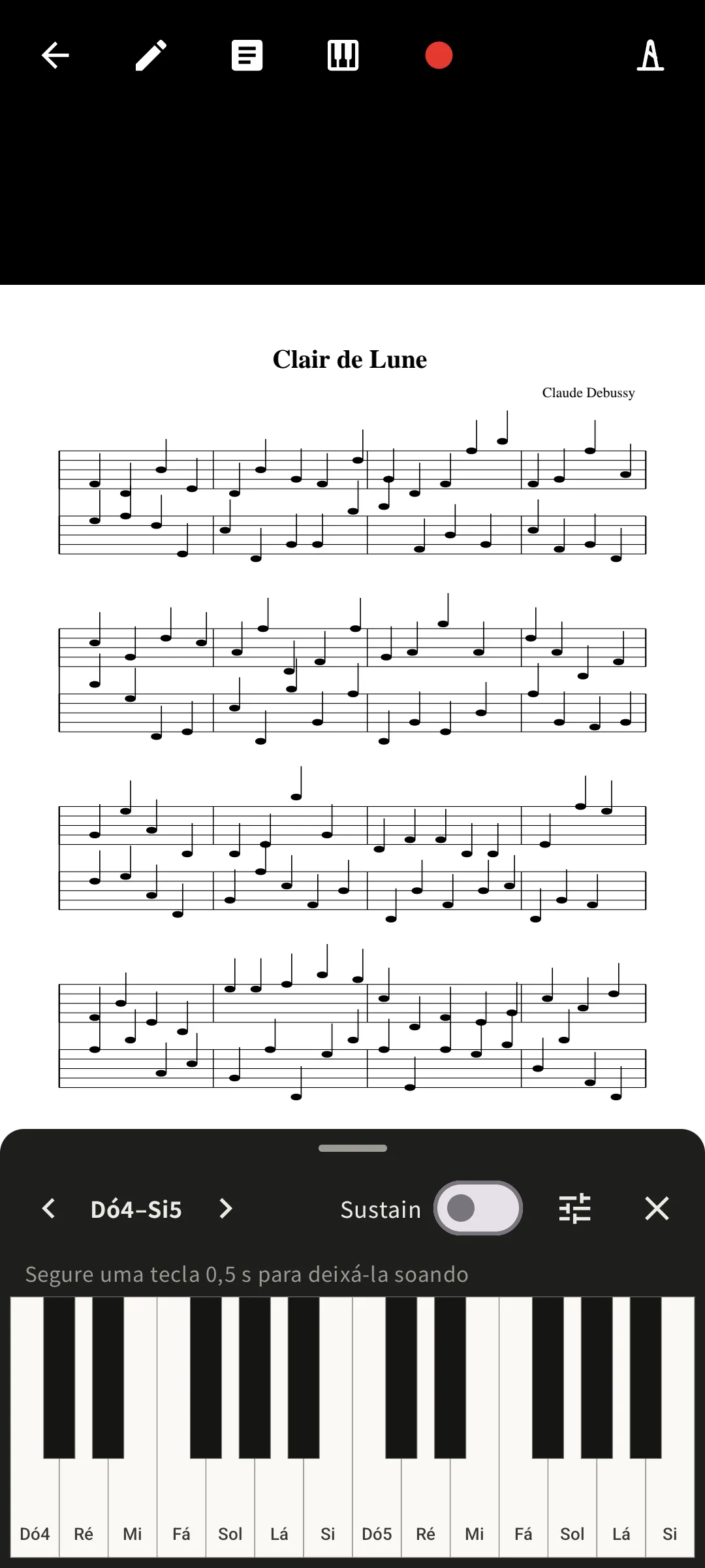 Partitura com o teclado de piano por cima